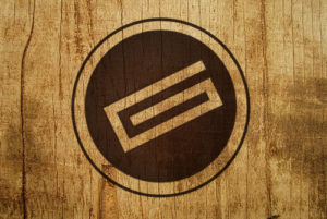 the goss agency logo on wood