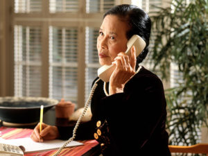 asian woman phone writing
