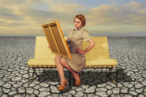 desert sky art woman staring at painting couch